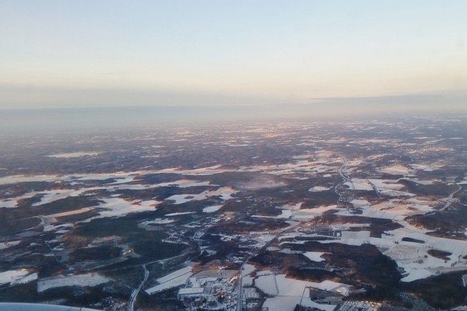 Horft yfir þúsund vatna landið Finnland úr flugvél í lok nóvember 2016.<br />
Finnar hafa aukið skógarþekju sína upp í 76 prósent. Mynd: Hreinn Óskarsson.